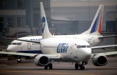 Медведев поручил проверить соблюдение трудовых прав в "Трансаэро" и UTair